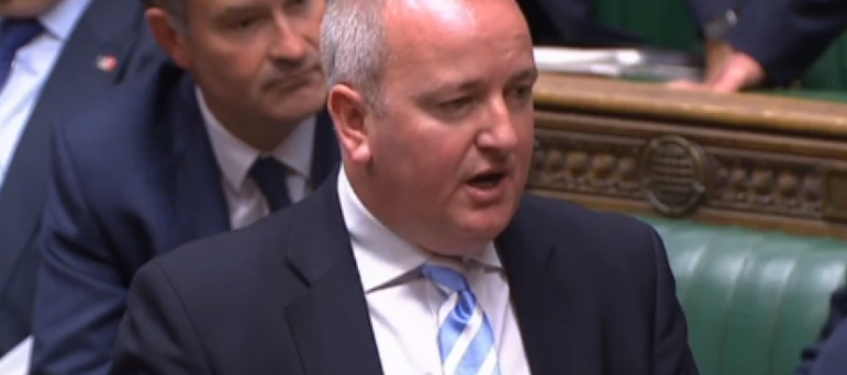 Mark Pritchard MP standing in the House of Commons giving a speech