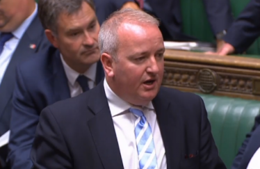 Mark Pritchard MP standing in the House of Commons giving a speech